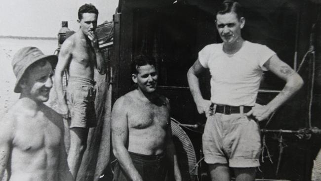 Members of the Z Special Unit prepare on board the Krait in an operation against the Japanese in Singapore Harbour.