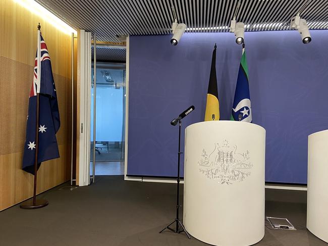 The Australian flag was moved from the backgroundof a Greens media conference.