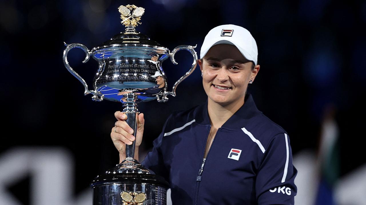 Australia's Ashleigh Barty poses with the Daphne Akhurst Memorial Cup after winning the Aussie Open. Photo by Martin KEEP / AFP.