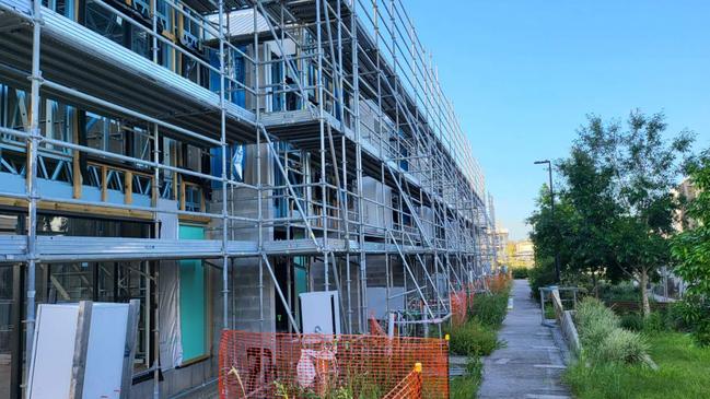 Scaffolding remains on the exterior of the Baringa project