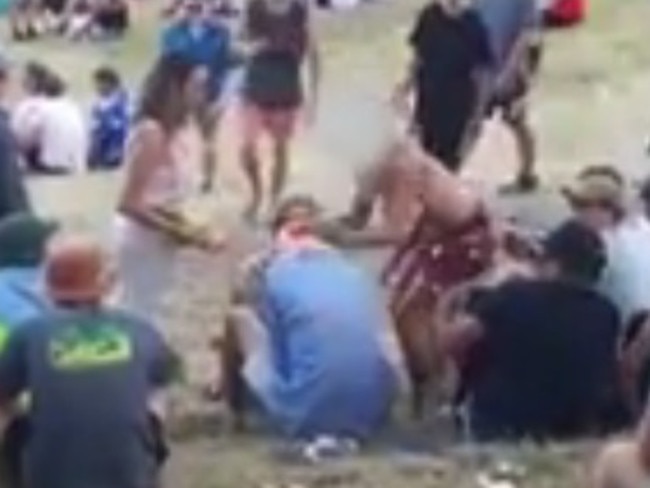 The man is hit by the woman after he groped her.