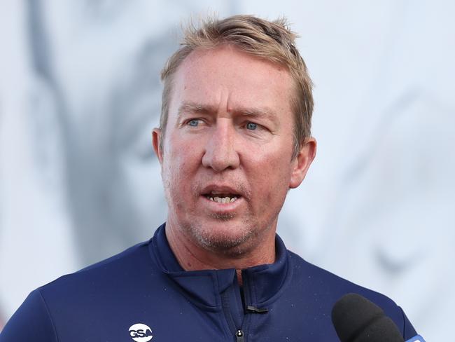 Pictured is Sydney Roosters coach Trent Robinson at club legends mural at Bondi Junction which now includes a portrait of retiring Sydney Roosters co-captain Jake Friend.Picture: Richard Dobson