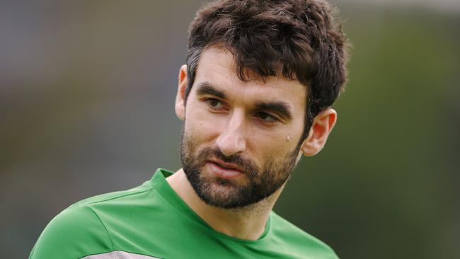 Mile Jedinak walking laps at Socceroos training.