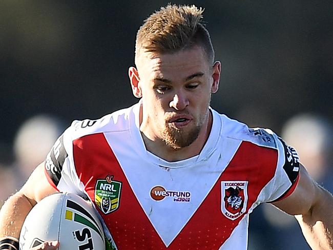 Matthew Dufty of the Dragons is tackled by Blake Austin of the Raiders during the Round 11 NRL match between the St George-Illawarra Dragons and the Canberra Raiders at Glen Willow Oval in Mudgee, NSW, Sunday, May 20, 2018. (AAP Image/Dan Himbrechts) NO ARCHIVING, EDITORIAL USE ONLY