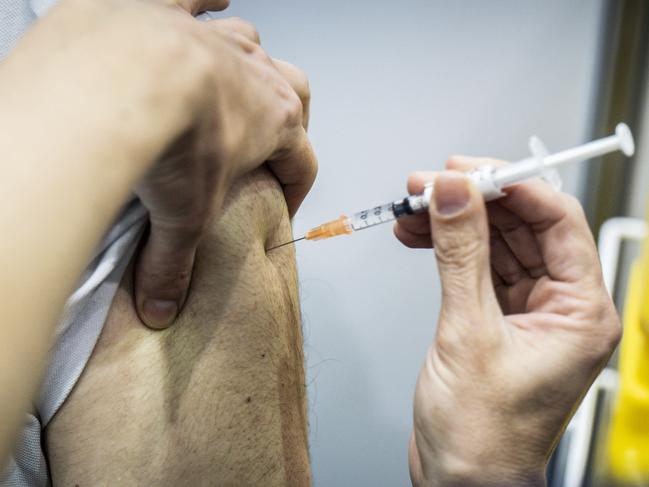 People are urged to get vaccinated. Picture: Tony McDonough/NCA NewsWire