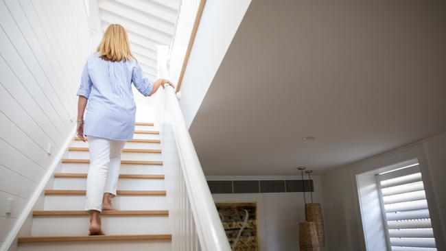 Deborah Hutton ascends her staircase. Picture: Renee Nowytarger