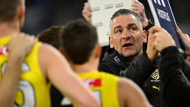 PERTH, AUSTRALIA - JULY 06: Adem Yze, Senior Coach of the Tigers addresses the players at the break during the 2024 AFL Round 17 match between the Fremantle Dockers and the Richmond Tigers  at Optus Stadium on July 06, 2024 in Perth, Australia. (Photo by Daniel Carson/AFL Photos via Getty Images)