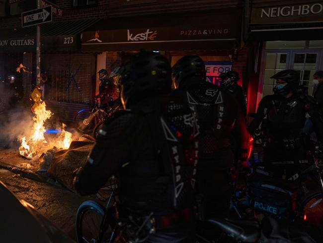 Chaos is unfolding in some US cities at the uncertain election results. Protesters caused havoc in Lower Manhattan on Thursday night. Picture: AFP