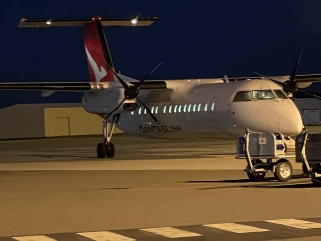 Passengers react to Qantas decision to suspend services .  Picture: Patrick Morrow