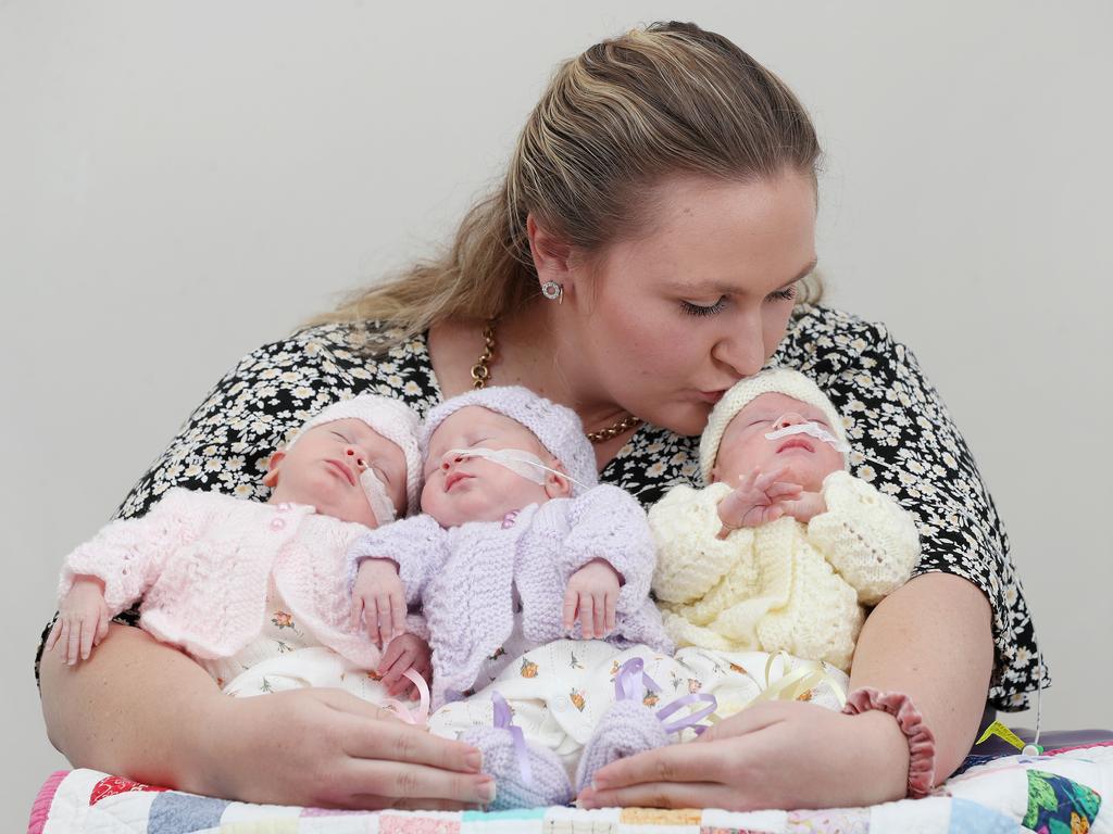 Breanna West with her five-week-old triplets Isabella, Charlotte and Maisie at Caboolture Hospital. Picture: Tara Croser