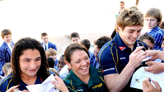 St Joseph’s Nudgee College Old Boy James O'Connor at the school with Saia Faingaa and Iliseva Batibasaga.