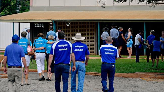 Family and friends arrive at Casuarina Street primary school for Dolly Everett's memorial service in Katherine, Northern Territory.