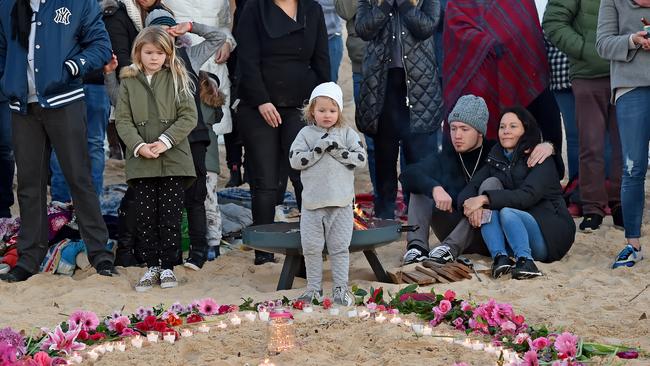 Friends and family gather to pay their respects to Justine. Picture: AAP Image/Troy Snook