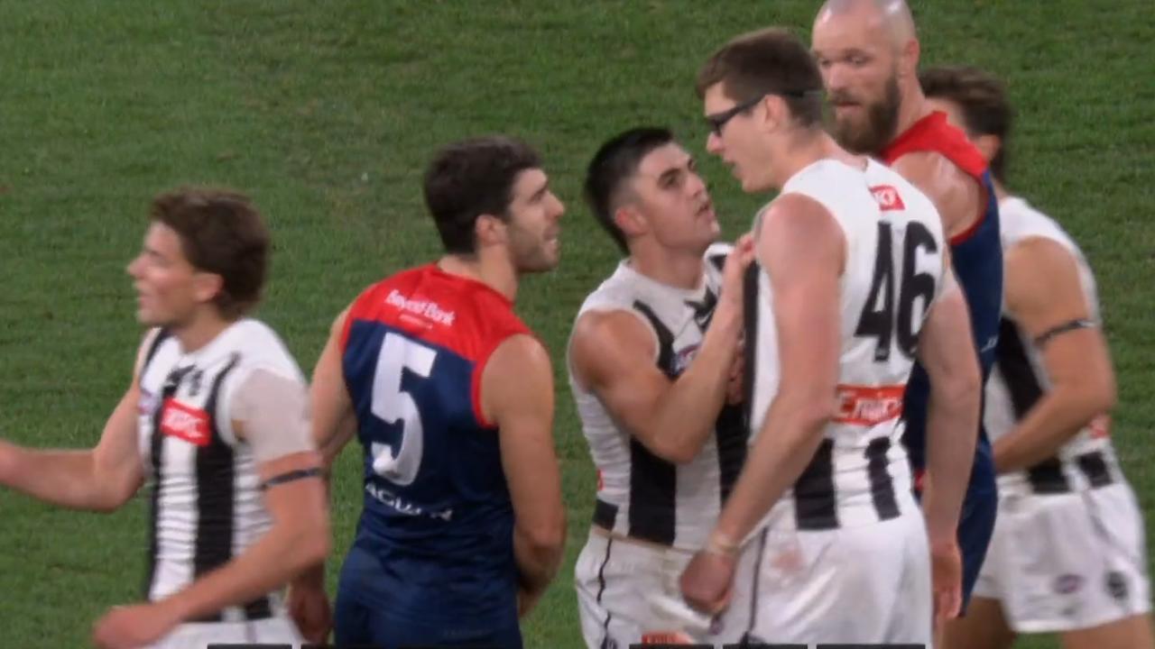 Mason Cox and Christian Petracca had words. Photo: Fox Footy.