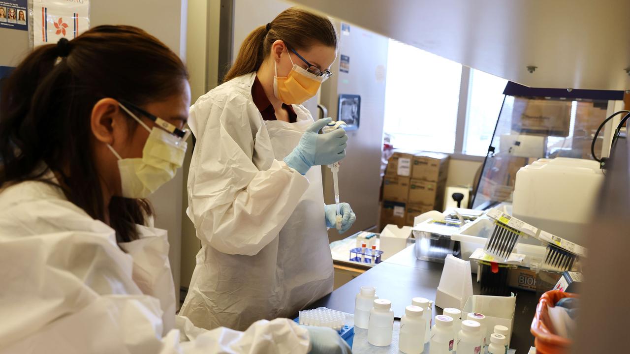 Medical lab scientists work on samples collected in the Novavax jab. Picture: Karen Ducey/Getty Images/AFP