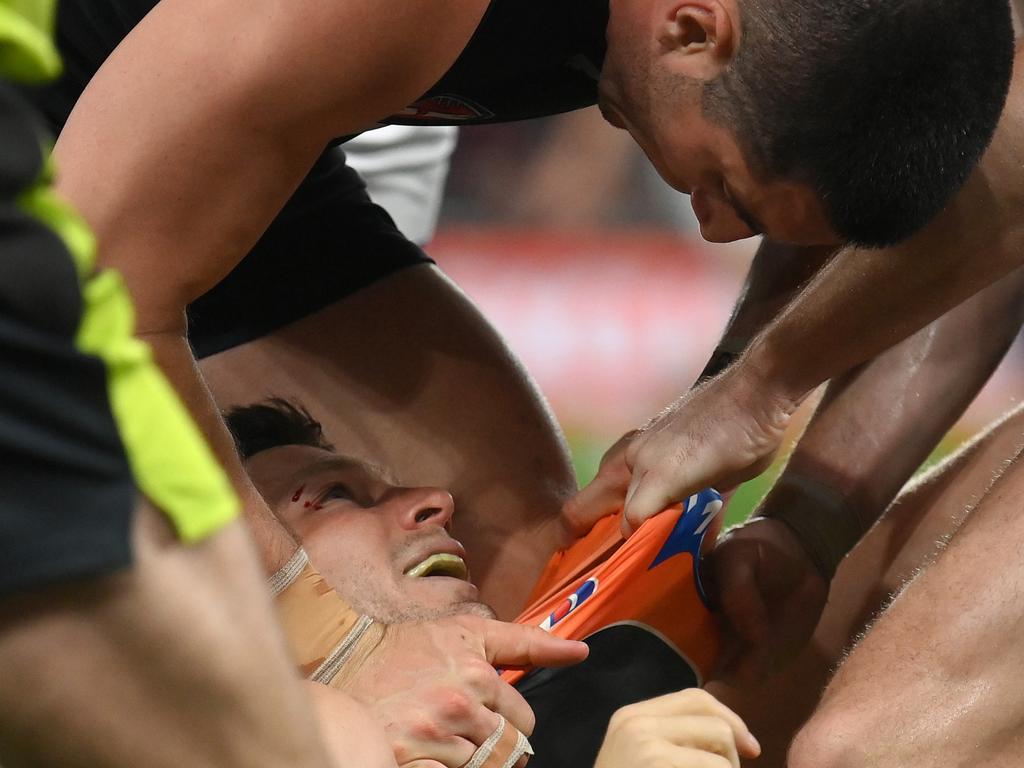 Jacob Weitering tangles with Toby Greene. Picture: Quinn Rooney/Getty Images