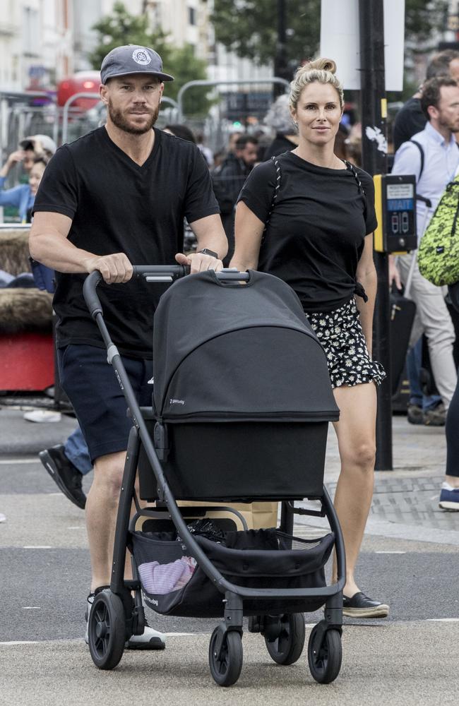 David Warner and wife Candice with their baby at Oxford Circus. Picture: Ella Pellegrini