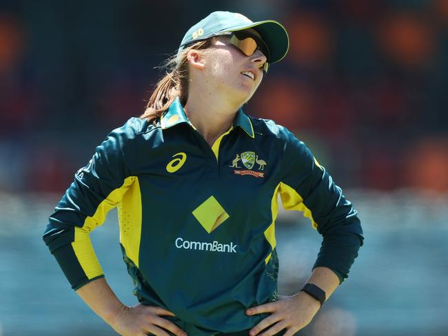 CANBERRA, AUSTRALIA - JANUARY 28:  Georgia Wareham of Australia reacts after an attempted catch during game two of the Women's T20 International series between Australia and South Africa at Manuka Oval on January 28, 2024 in Canberra, Australia. (Photo by Mark Metcalfe/Getty Images)