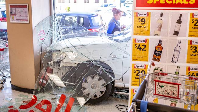 Coles crash: The shattered front doors of Coles at Umina Beach. Picture: Gary Brown.