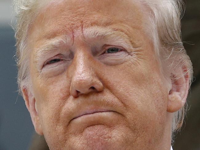 President Donald Trump visits Saint John Paul II National Shrine with first lady Melania Trump, Tuesday, June 2, 2020, in Washington. (AP Photo/Patrick Semansky)