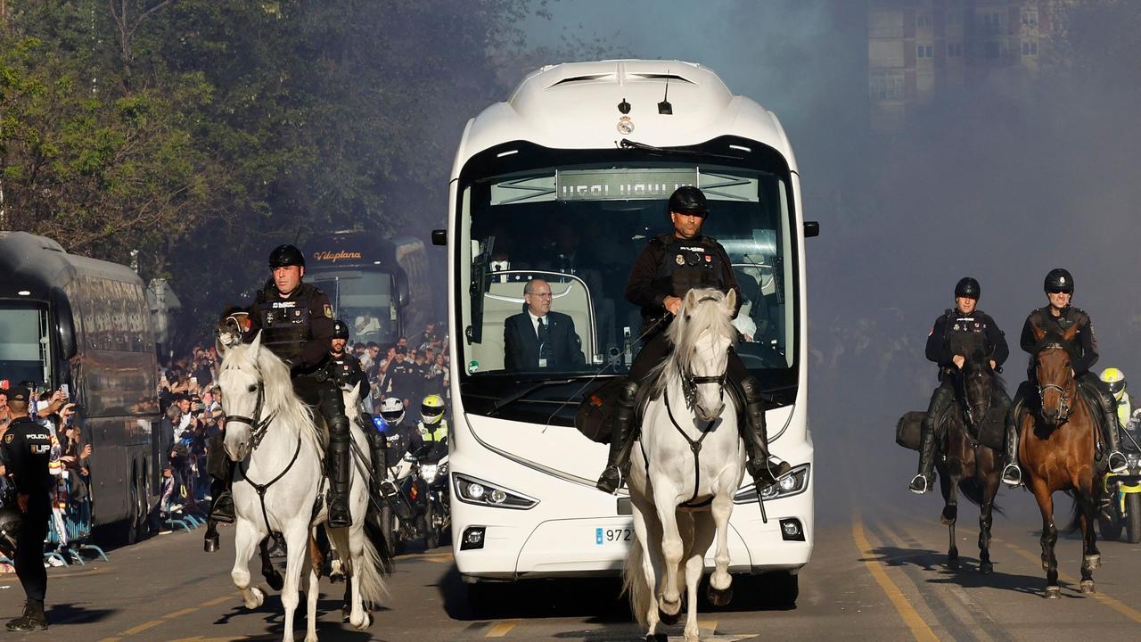 Real Madrid's bus arrives escorted by Spanish national police officers prior to the UEFA Champions League quarter final first leg. Picture: OSCAR DEL POZO / AFP