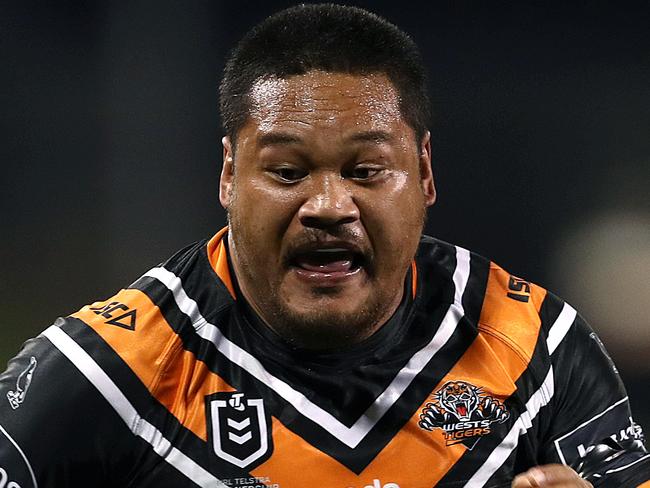 Joey Leilua of the Tigers scoring a try during the Round 6 NRL match between the Wests Tigers and the North Queensland Cowboys at Campbelltown Stadium in Sydney, Saturday, June 20, 2020. (AAP Image/Brendon Thorne) NO ARCHIVING, EDITORIAL USE ONLY