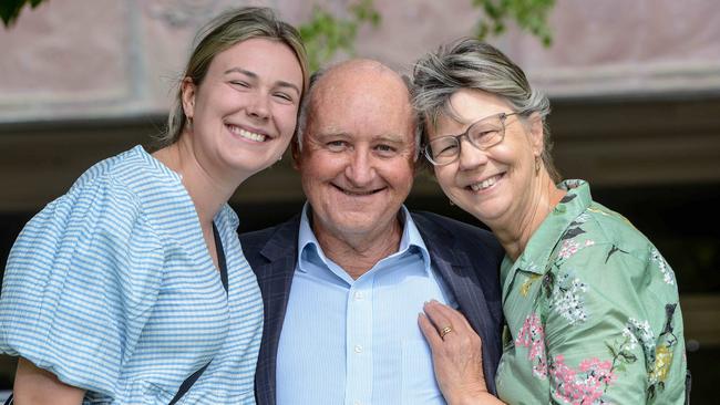 Former Renewal SA boss John Hanlon, centre, with daughter Millie and wife Jenny after the DPP withdrew all charges against him. Picture: NCA NewsWire / Brenton Edwards