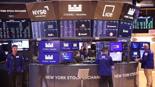 NEW YORK, NEW YORK - JANUARY 22: Traders work on the floor of the New York Stock Exchange during morning trading on January 22, 2025 in New York City. Stocks continued an upward swing opening up high a day after the Dow Jones closed up 500 points and the S&P 500 approaching an all-time high. The rise comes after OpenAI CEO Sam Altman, SoftBank CEO Masayoshi Son and Oracle Chairman Larry Ellison made an announcement alongside President Donald Trump that they will create a new company, called Stargate, to grow artificial intelligence infrastructure in the U.S.   Michael M. Santiago/Getty Images/AFP (Photo by Michael M. Santiago / GETTY IMAGES NORTH AMERICA / Getty Images via AFP)