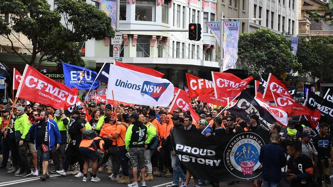 Trade and construction workers take part in a protest march in Sydney, Thursday, September 6, 2018. Thousands of workers rallied demanding the abolition of the Morrison Government's Australian Building and Construction Commission (ABCC). (AAP Image/Dan Himbrechts) NO ARCHIVING