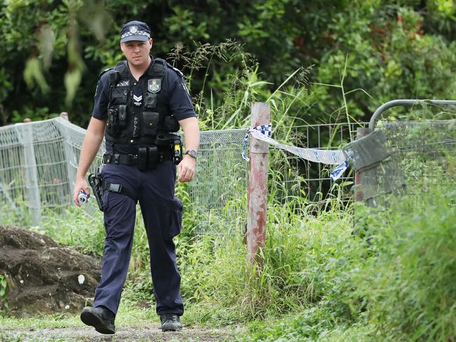 A police officer at the Taigum home this week. Picture: Liam Kidston