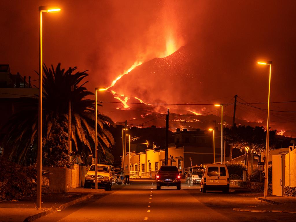 A car drives through an empty street on October 9, 2021. Picture: Marcos del Mazo/Getty Images