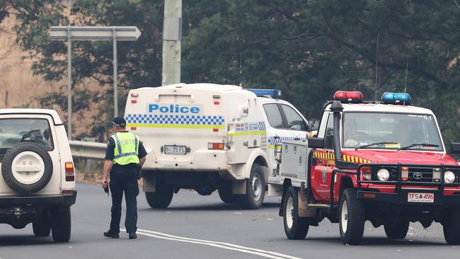 An earlier police roadblock on the Huon Highway heading into Geeveston. Picture: NIKKI DAVIS-JONES