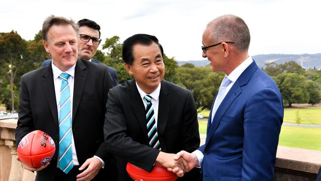 Keith Thomas, Guojie Gui and South Australian Premier Jay Weatherill. Picture: Morgan Sette.