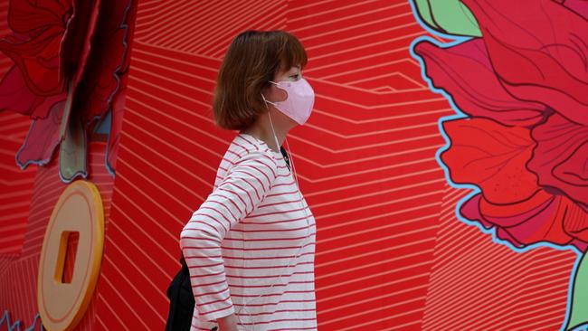 A woman wears a face mask in Hong Kong on February 5, 2020, as a preventive measure following a virus outbreak which began in the Chinese city of Wuhan. Picture: AFP