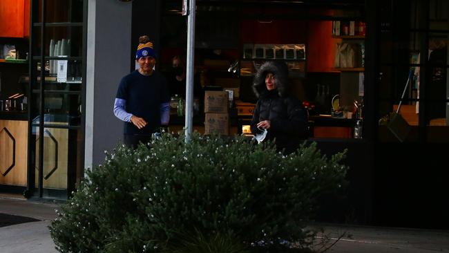 Mr Moses and Ms Berejiklian outside the cafe on Sunday.