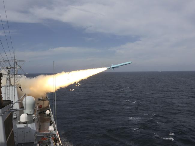 A missile is launched from a guided-missile destroyer during a live ammunition drill in the East China Sea this month. Picture: Wu Dengfeng/Xinhua