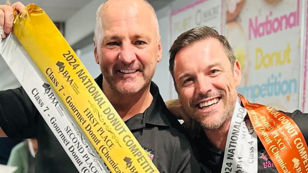 David Moore and partner Andrew Clarke with ribbons from the Baking Association of Australia’s Excellence in Baking Awards.
