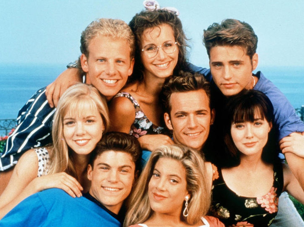 Luke Perry, centre, with 90210 co-stars Ian Ziering, Jason Priestley, Brian Austin Green, Tori Spelling, Jennie Garth, Gabrielle Carteris and Shannen Doherty. 