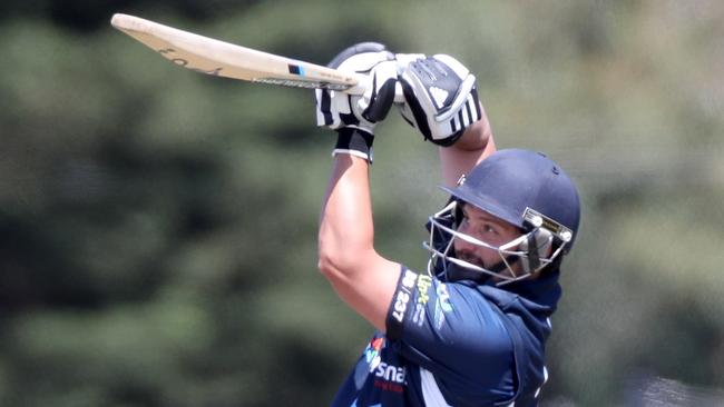 Hoppers Crossing batsman Luke Goegan hits out against Mt Waverley last season.