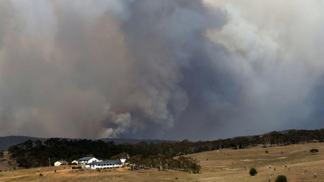 A large fire is burning out of control in the small country area of Bombay, NSW just outside of Braidwood in NSW. RFS volunteers from Carwoola protect property. Picture Gary Ramage