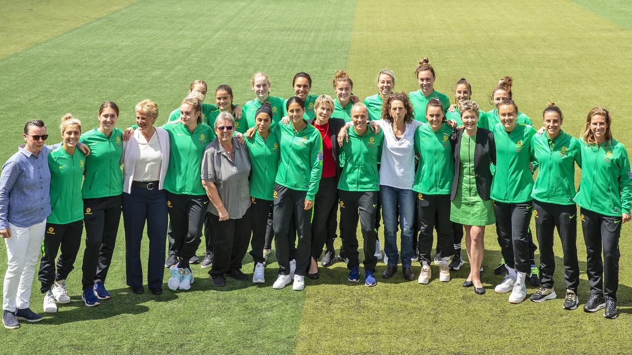Players from the 1979 Matildas team and current Matildas team pose for a group photo. Photo by Jenny Evans/Getty Images)