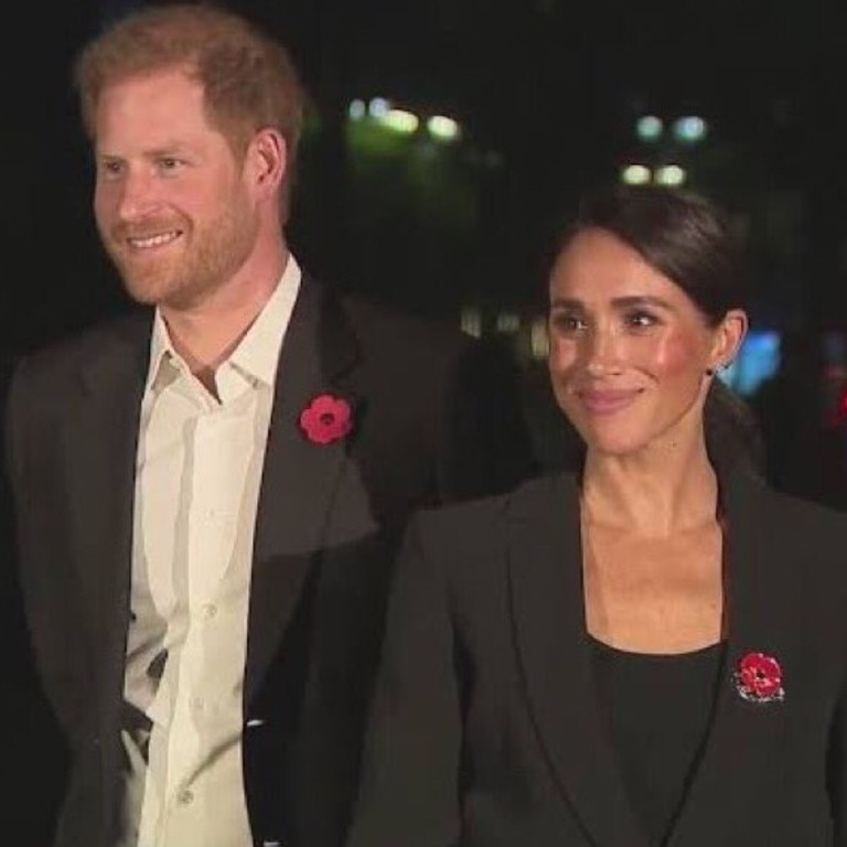 Prince Harry and Meghan Markle at the opening of a US Navy SEALs fitness centre. Picture: Twitter