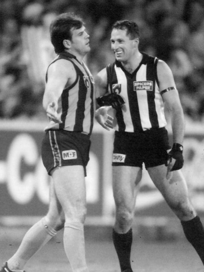 Former Collingwood player Craig Kelly with Jason Dunstall in 1995.