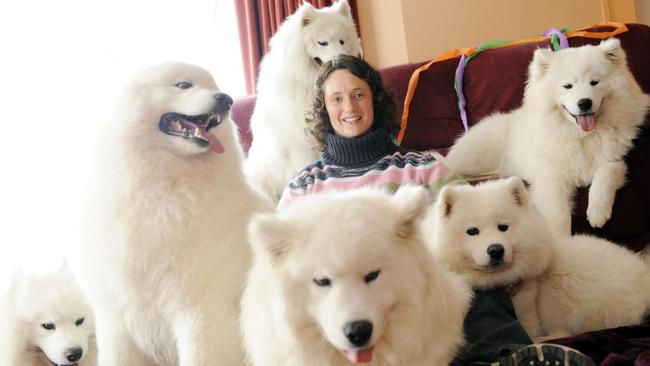 Atelia Watkins and her dogs in happier times.