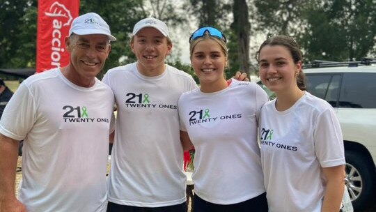 Alastair Clarkson (left) with a couple of other runners and Delaney Troon (second right). Picture: Holly Draffin.