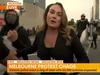 Journo mobbed, protesters throw poo at cops