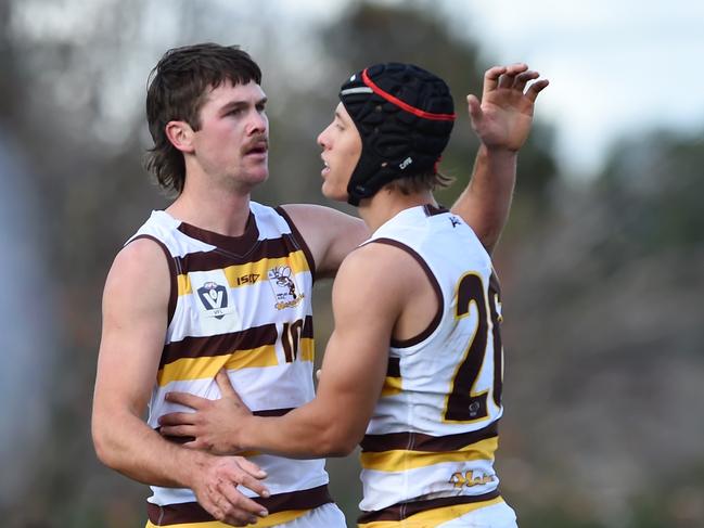 Ryan Banks-Smith (right) celebrates an Aspley goal. Picture: Steve Tanner