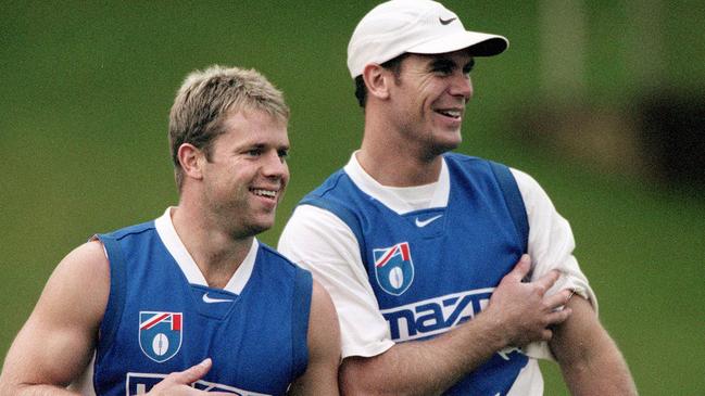 Glenn Archer and Wayne Carey at training in April, 1999.