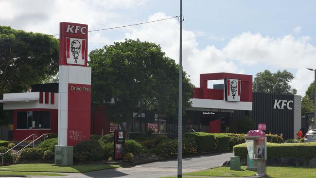 Workmen on the job at KFC Nerang, which is closed while the work is carried out. Picture Glenn Hampson