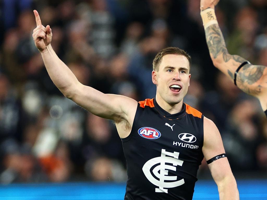 MELBOURNE, AUSTRALIA – JUNE 21: Matthew Owies of the Blues celebrates kicking a goal with Zac Williams of the Blues during the round 15 AFL match between Carlton Blues and Geelong Cats at Melbourne Cricket Ground, on June 21, 2024, in Melbourne, Australia. (Photo by Quinn Rooney/Getty Images)